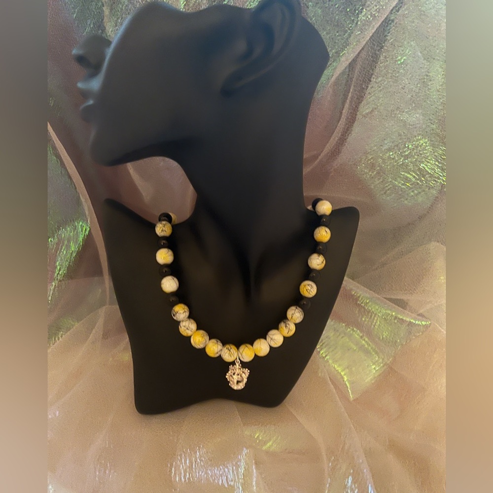 One of a Kind: Never Worn
Stretch Necklace: For the woman with nails
By Chelsea’